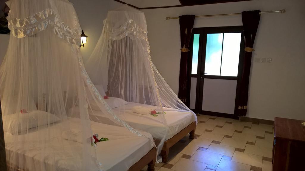 Etoile Labrine Guest House La Digue Ruang foto